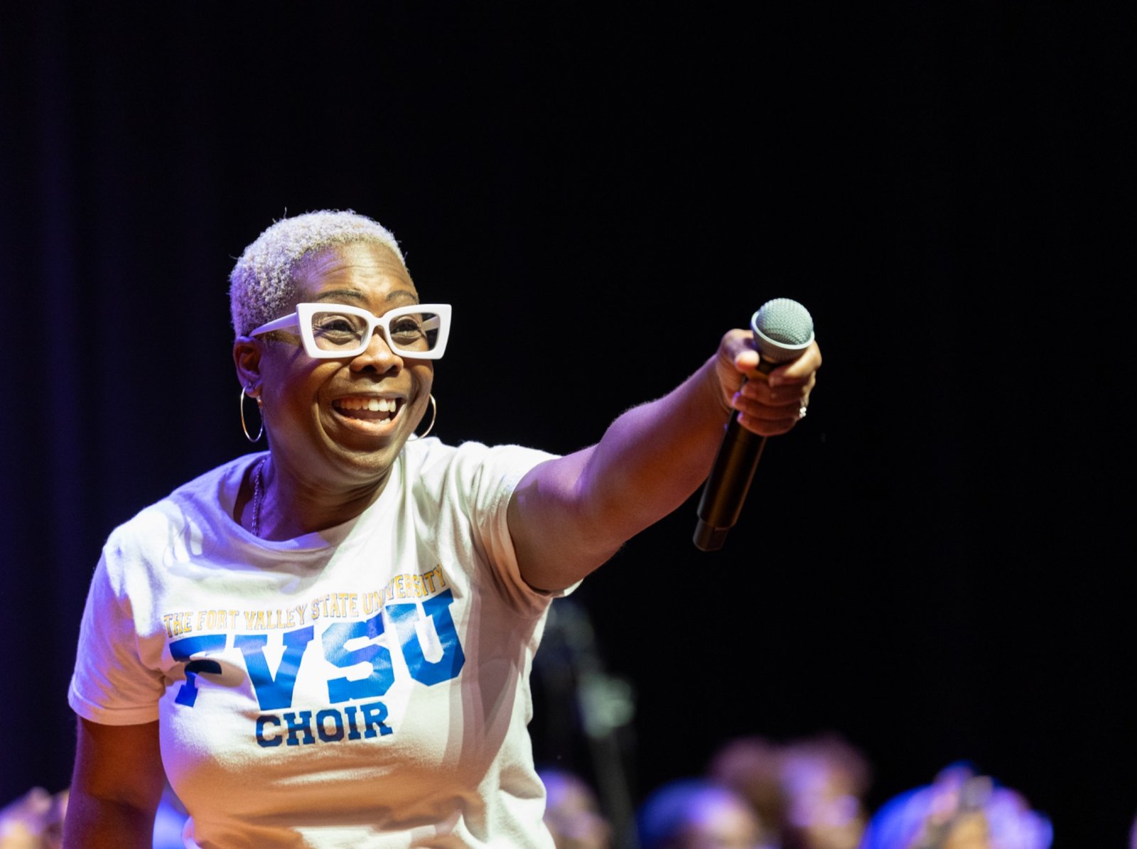 Alicia Carner-McDonald leading a choir experience