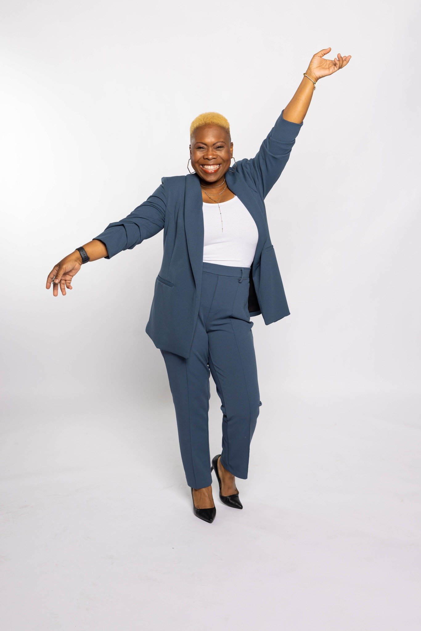 Alicia Carner-McDonald celebrating with arms raised